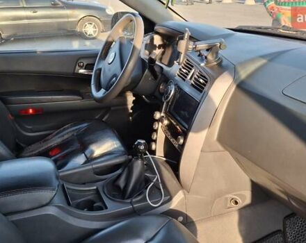 Серый Cанг Йонг Кирон, объемом двигателя 2 л и пробегом 355 тыс. км за 6800 $, фото 3 на Automoto.ua