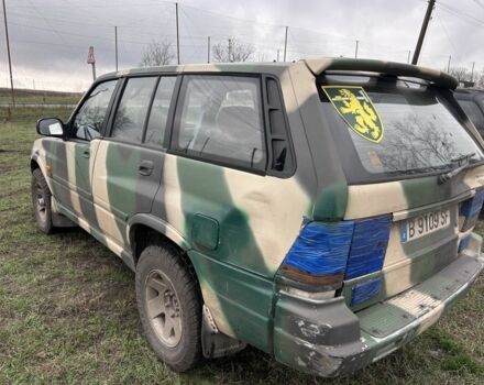 Белый Cанг Йонг Муссо, объемом двигателя 2.9 л и пробегом 200 тыс. км за 1426 $, фото 4 на Automoto.ua