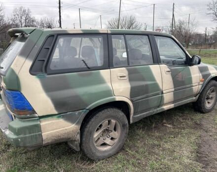 Белый Cанг Йонг Муссо, объемом двигателя 2.9 л и пробегом 200 тыс. км за 1426 $, фото 2 на Automoto.ua