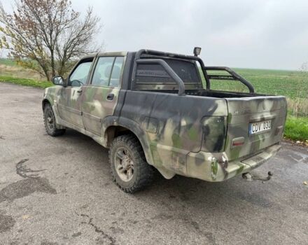 Бежевый Cанг Йонг Муссо, объемом двигателя 2.9 л и пробегом 200 тыс. км за 2200 $, фото 2 на Automoto.ua