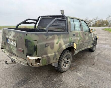 Бежевый Cанг Йонг Муссо, объемом двигателя 2.9 л и пробегом 200 тыс. км за 2200 $, фото 1 на Automoto.ua