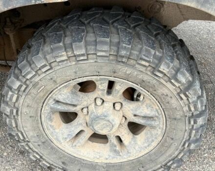 Бежевый Cанг Йонг Муссо, объемом двигателя 2.9 л и пробегом 200 тыс. км за 2200 $, фото 5 на Automoto.ua