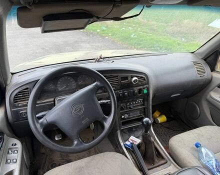 Бежевый Cанг Йонг Муссо, объемом двигателя 2.9 л и пробегом 200 тыс. км за 2200 $, фото 3 на Automoto.ua