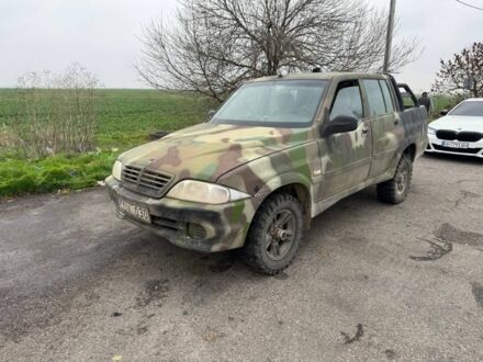 Бежевый Cанг Йонг Муссо, объемом двигателя 2.9 л и пробегом 200 тыс. км за 2200 $, фото 1 на Automoto.ua