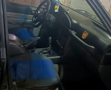 Чорний Cанг Йонг Муссо, об'ємом двигуна 2.9 л та пробігом 320 тис. км за 3300 $, фото 6 на Automoto.ua