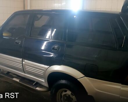 Чорний Cанг Йонг Муссо, об'ємом двигуна 2.9 л та пробігом 320 тис. км за 3300 $, фото 10 на Automoto.ua