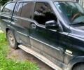 Чорний Cанг Йонг Муссо, об'ємом двигуна 2.9 л та пробігом 250 тис. км за 3790 $, фото 1 на Automoto.ua