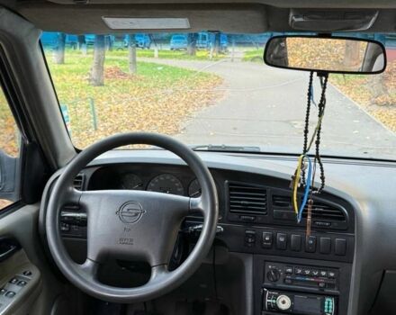 Серый Cанг Йонг Муссо, объемом двигателя 3 л и пробегом 300 тыс. км за 2350 $, фото 5 на Automoto.ua