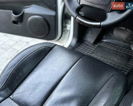 Білий Cанг Йонг Rexton, об'ємом двигуна 2.7 л та пробігом 245 тис. км за 7850 $, фото 27 на Automoto.ua