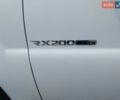Білий Cанг Йонг Rexton, об'ємом двигуна 2 л та пробігом 232 тис. км за 10299 $, фото 9 на Automoto.ua