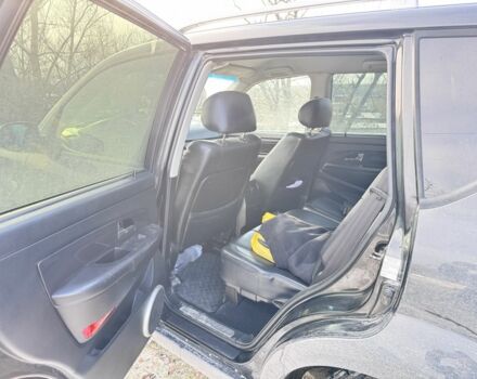 Чорний Cанг Йонг Rexton, об'ємом двигуна 2.7 л та пробігом 303 тис. км за 4500 $, фото 6 на Automoto.ua