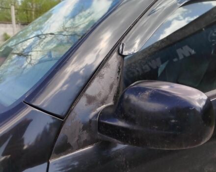 Черный Cанг Йонг Рекстон, объемом двигателя 2.7 л и пробегом 340 тыс. км за 8800 $, фото 2 на Automoto.ua