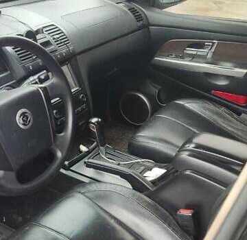 Черный Cанг Йонг Рекстон, объемом двигателя 2.7 л и пробегом 300 тыс. км за 3800 $, фото 2 на Automoto.ua