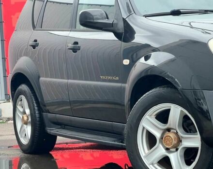 Чорний Cанг Йонг Rexton, об'ємом двигуна 2.7 л та пробігом 215 тис. км за 4500 $, фото 4 на Automoto.ua