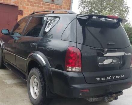 Черный Cанг Йонг Рекстон, объемом двигателя 2.7 л и пробегом 300 тыс. км за 3800 $, фото 1 на Automoto.ua