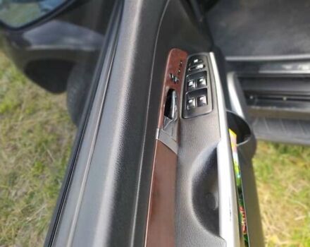 Черный Cанг Йонг Рекстон, объемом двигателя 2.7 л и пробегом 380 тыс. км за 7500 $, фото 5 на Automoto.ua