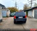 Черный Cанг Йонг Рекстон, объемом двигателя 2.7 л и пробегом 300 тыс. км за 2950 $, фото 2 на Automoto.ua