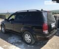 Чорний Cанг Йонг Rexton, об'ємом двигуна 2.3 л та пробігом 198 тис. км за 7150 $, фото 1 на Automoto.ua