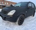 Черный Cанг Йонг Рекстон, объемом двигателя 2.7 л и пробегом 233 тыс. км за 3300 $, фото 1 на Automoto.ua