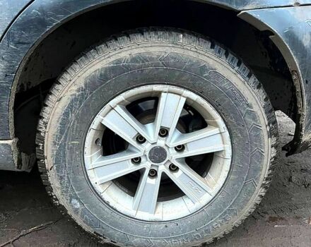 Черный Cанг Йонг Рекстон, объемом двигателя 2.7 л и пробегом 245 тыс. км за 2500 $, фото 4 на Automoto.ua