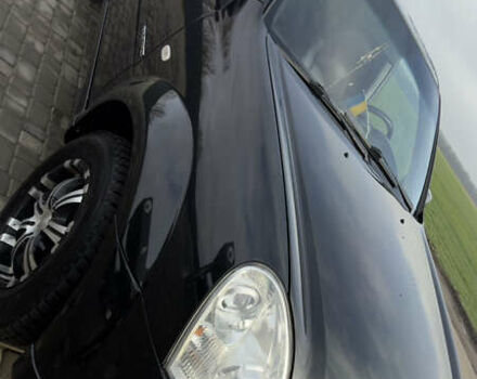 Черный Cанг Йонг Рекстон, объемом двигателя 2.7 л и пробегом 280 тыс. км за 8500 $, фото 2 на Automoto.ua