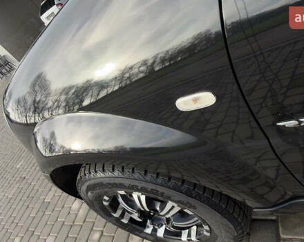 Черный Cанг Йонг Рекстон, объемом двигателя 2.7 л и пробегом 280 тыс. км за 8500 $, фото 4 на Automoto.ua