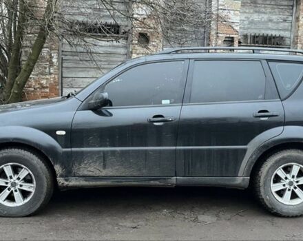 Черный Cанг Йонг Рекстон, объемом двигателя 2.7 л и пробегом 247 тыс. км за 2500 $, фото 1 на Automoto.ua