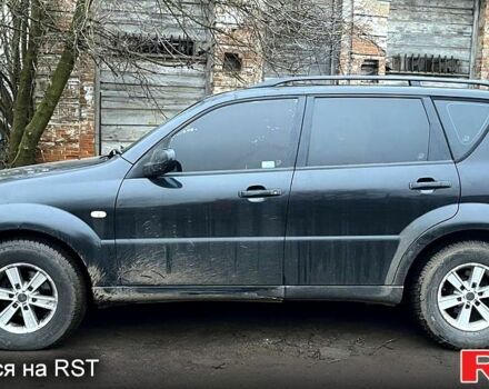 Черный Cанг Йонг Рекстон, объемом двигателя 2.7 л и пробегом 245 тыс. км за 2500 $, фото 1 на Automoto.ua