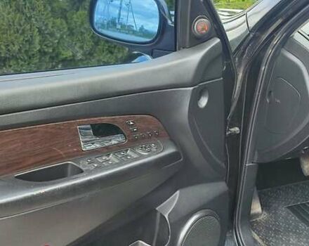 Черный Cанг Йонг Рекстон, объемом двигателя 2.7 л и пробегом 230 тыс. км за 8000 $, фото 12 на Automoto.ua