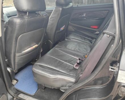 Черный Cанг Йонг Рекстон, объемом двигателя 2.7 л и пробегом 320 тыс. км за 7300 $, фото 3 на Automoto.ua