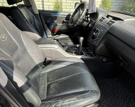 Чорний Cанг Йонг Rexton, об'ємом двигуна 2.7 л та пробігом 300 тис. км за 4500 $, фото 4 на Automoto.ua