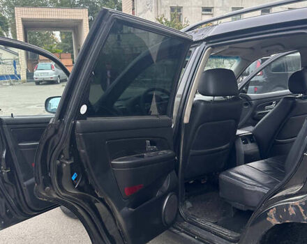 Чорний Cанг Йонг Rexton, об'ємом двигуна 2.7 л та пробігом 248 тис. км за 4100 $, фото 12 на Automoto.ua