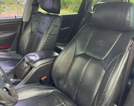 Чорний Cанг Йонг Rexton, об'ємом двигуна 2.7 л та пробігом 213 тис. км за 9500 $, фото 7 на Automoto.ua