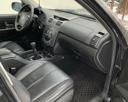 Черный Cанг Йонг Рекстон, объемом двигателя 2.7 л и пробегом 232 тыс. км за 6600 $, фото 9 на Automoto.ua