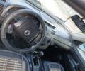Черный Cанг Йонг Рекстон, объемом двигателя 2.7 л и пробегом 258 тыс. км за 6700 $, фото 7 на Automoto.ua