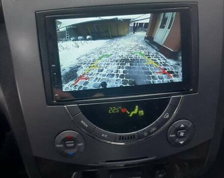 Черный Cанг Йонг Рекстон, объемом двигателя 2.7 л и пробегом 285 тыс. км за 8500 $, фото 5 на Automoto.ua