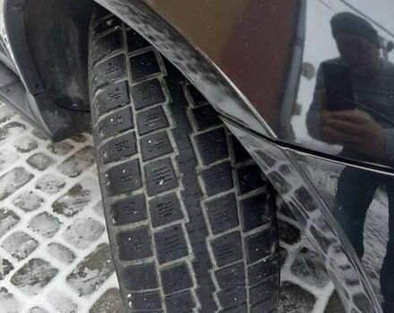 Черный Cанг Йонг Рекстон, объемом двигателя 2.7 л и пробегом 285 тыс. км за 8500 $, фото 1 на Automoto.ua