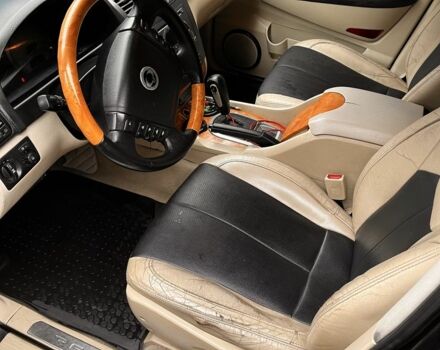 Чорний Cанг Йонг Rexton, об'ємом двигуна 2.7 л та пробігом 270 тис. км за 7000 $, фото 6 на Automoto.ua