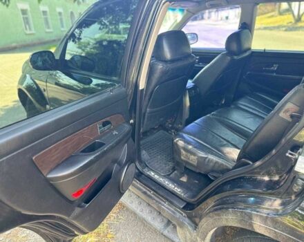 Черный Cанг Йонг Рекстон, объемом двигателя 2.7 л и пробегом 300 тыс. км за 5800 $, фото 7 на Automoto.ua