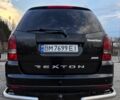 Черный Cанг Йонг Рекстон, объемом двигателя 2.7 л и пробегом 220 тыс. км за 8531 $, фото 5 на Automoto.ua