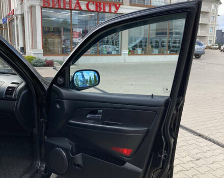 Чорний Cанг Йонг Rexton, об'ємом двигуна 2.7 л та пробігом 159 тис. км за 9500 $, фото 12 на Automoto.ua