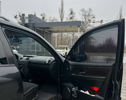 Черный Cанг Йонг Рекстон, объемом двигателя 2.7 л и пробегом 318 тыс. км за 8700 $, фото 11 на Automoto.ua