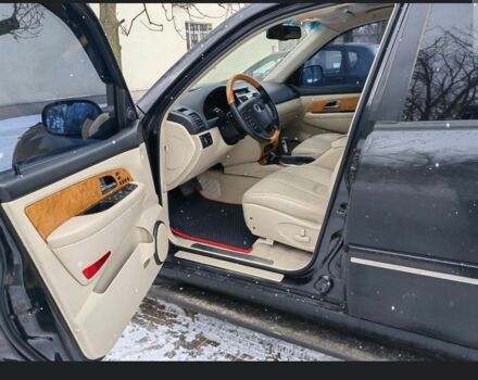 Черный Cанг Йонг Рекстон, объемом двигателя 2.7 л и пробегом 62 тыс. км за 10000 $, фото 4 на Automoto.ua