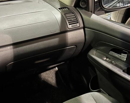 Черный Cанг Йонг Рекстон, объемом двигателя 2.7 л и пробегом 63 тыс. км за 11440 $, фото 16 на Automoto.ua