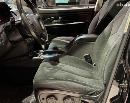 Черный Cанг Йонг Рекстон, объемом двигателя 2.7 л и пробегом 63 тыс. км за 11440 $, фото 7 на Automoto.ua