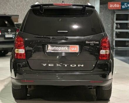 Черный Cанг Йонг Рекстон, объемом двигателя 2.7 л и пробегом 63 тыс. км за 11440 $, фото 4 на Automoto.ua