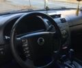 Черный Cанг Йонг Рекстон, объемом двигателя 2.7 л и пробегом 170 тыс. км за 11200 $, фото 3 на Automoto.ua