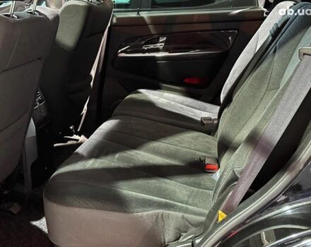 Черный Cанг Йонг Рекстон, объемом двигателя 2.7 л и пробегом 63 тыс. км за 11440 $, фото 11 на Automoto.ua