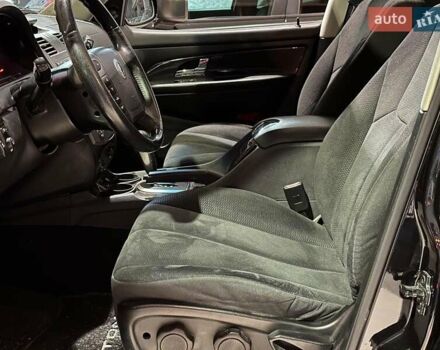 Черный Cанг Йонг Рекстон, объемом двигателя 2.7 л и пробегом 63 тыс. км за 11440 $, фото 7 на Automoto.ua