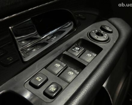 Черный Cанг Йонг Рекстон, объемом двигателя 2.7 л и пробегом 63 тыс. км за 11440 $, фото 9 на Automoto.ua